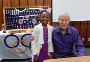 Jaiya Patillo with Former 1956 Olympic Gold Medalist Thane Baker